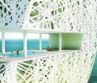 Oppenheim’s Sloping Beach Tower Hides a Green Oasis Inside