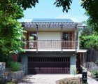 Self-Sufficient Eco House Reuses 95% of Existing Building Materials