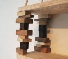 Bookshelf Built Simply from Waste Wood Blocks and Rope
