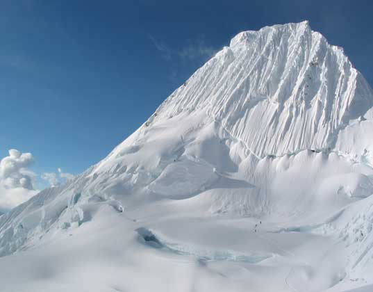 Peruvian team is whitewashing a mountain to try to bring back a glacier. global warming, climate change, melting glaciers, reduced snowfall, peruvain glaciers melting, peruvian glaciers dissappearing, eduardo gold, painting a mountian, painting a glacier, whitewashing a mountain