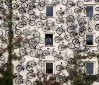 Bike Shop Attracts Buyers with 120 Bikes Mounted to the Facade