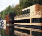 Wood-Wrapped Floating House Maximizes Urban Growth