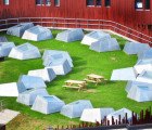 Housing for Musicians has Parasitic Rooms and Skylight Pyramids