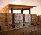 Two Striking Urban Farm Buildings Made from Shipping Pallets