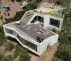 Casa V House Has a Green Roof Room With a View