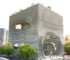 BIG Unveils Gigantic Cube Building with a Rooftop Park