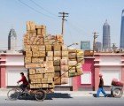 Unbelievable Stacks of Chinese Goods Piled High on Bikes