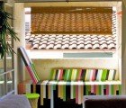 Rainbow Colored Lounger Made from Used Ikea Lack Tables