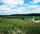 Green-Roofed Longhouse Blends Into the Kansas Prairie