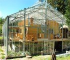 Naturhus: An Entire House Wrapped in Its Own Private Greenhouse
