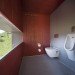 Green restroom, public restroom, log facade, stick facade, golf Lauterhofen, Berschneider + Berschneider, german green building, german log design, natural materials facade