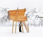 Spuce Treehouse is a Wintry Backyard Playground for Kids