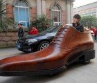 Giant Shoe Shaped Electric Vehicle by AoKang Cruises Chinese Streets