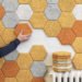 Form Us With Love's wood wool tiles being applied to a wall