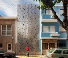 House 77 is a Modern Home Sheathed in a Funky Perforated Aluminum Facade