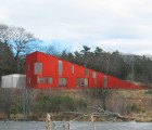 Min Day’s Wedge House is a Giant Red Doorstopper Shaped Home