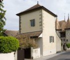 16th Century Tower Converted to Residence with 3 Storey Wooden “Parasite”