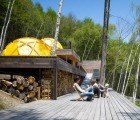 Japanese Mountain Retreat Features Bright Yellow Dome Tents and Locally Harvested Timber