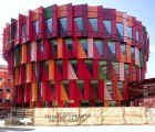 Multi-Hued Kuggen Building (the Cog) Features A Rotating Photovoltaic Shade Screen