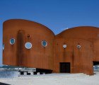 Cylindrical Green Roofed Japanese Tsunami Control Center Lets Waves Pass Right Underneath