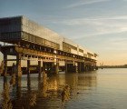 Kraanspoor Office Building Hovers Above Repurposed Craneway in Amsterdam Harbor