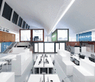 16 Well-Traveled Shipping Containers Add a Pop of Color to Group 8′s Architecture Office
