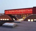 Swanky Shipping Container Sjakket House For Immigrant Youth Used to be a Moldy Factory