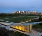 Gorgeous Green-Roofed Structure Hides a Massive Parking Lot