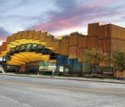 Rolling Green-Roofed Environmental Center Made from 65 Shipping Containers