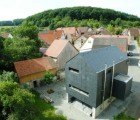 Haus Köhle: Modern Passive Solar Farmhouse is Wrapped in a Shining Slate Skin