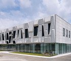 Gorgeous Geometric Facade Crowns Solar-Powered Office in Italy