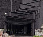 Striking Black NO99 Theater Is a Temporary Structure Made From Straw Bales