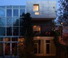 Lovely Lighthouse Addition by BYTR Architects is Wrapped in Aluminum Mesh