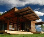 Gorgeous Ruby Springs Prefab Features Hydraulic Shade Screens That Open Up to the Landscape