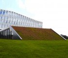 Henning Larsen’s Viborg Town Hall Boasts a Sloped Plane of Gradated Greenery