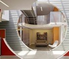 A Series of Clever Circular Cutouts Transforms Two Historic Structures into Mlicki’s Modern Offices
