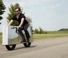 Moto Undone: Minimalist Mirrored Electric Motorcycle Flies Through the Streets