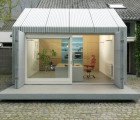 Eindhoven Garage Transformed Into Light-Filled Home Office With a Perforated Metal Skin