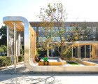 Rollercoaster: Louvered Pavilion Snakes Around a Schoolyard Like an Amusement Park Ride