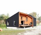 The Rubber House is a Prefab Home Made from Secondhand Materials in The Netherlands