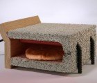 Adi Zaffran’s Ultra Minimalist Toaster is Made From a Cinder Block, Rebar Rods, and a Piece of Wood