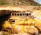 Inca Bridge: A Golden Mineral Arch Forms a Natural Bridge at the Foot of Mount Aconcagua