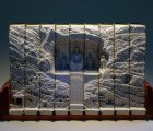 Guy Laramee Carves Gorgeous Landscapes Into the Edges of Books