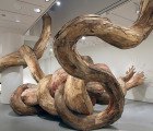Henrique Oliveira’s Powerful Recycled Wood “Tridimensional” Sculptures Burst Through Gallery Walls