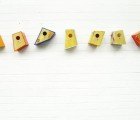 Peter Marigold’s Geometric Birdhouses are Crafted from Salvaged Shop Signs