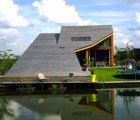 Ultra Minimalist Dogma House Has a Sloping Roof Ramp That Leads to a Lake