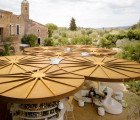 Rustic Parasol Pavilion Pops Up Atop Renovated 14th Century Spanish Castle