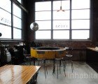 Montreal’s Cluny ArtBar is a Hot Spot Furnished with Salvaged Materials
