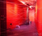 Artist Transforms Storefront for Art & Architecture Into a Bright Red Interactive Instrument