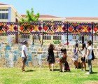 Kids, Parents and Teachers Join Forces to Create a Colorful Installation with 2,100 Plastic Bottles